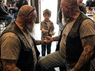 “I saved $11 from my piggy bank,” the little boy whispered to a bar full of bikers. When the club president heard who his father was, he ordered 40 motorcycles to start their engines.