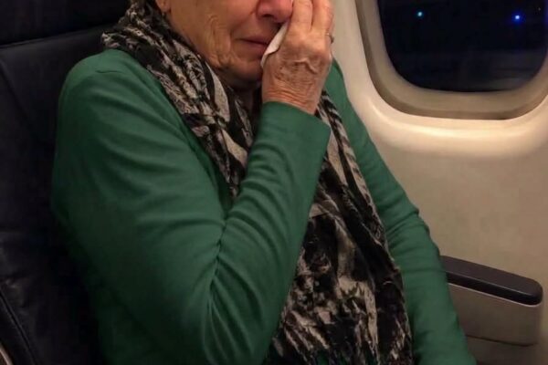 “Keep it down or get out!” a passenger shouted at me on a flight — then the flight attendant asked to see my mom’s boarding pass.