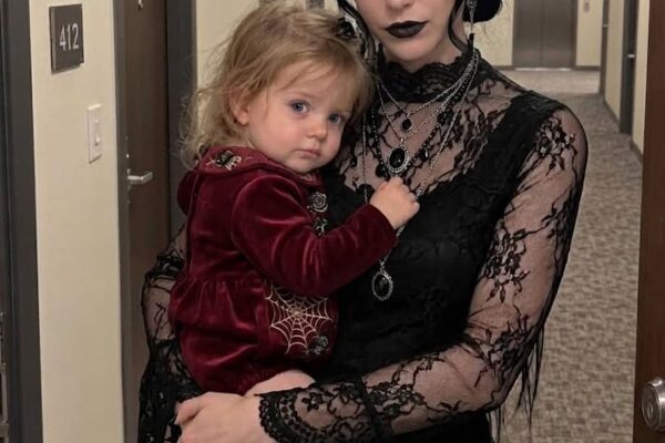 The Goth Woman Across the Hall Never Spoke to Anyone – Then One Night She Knocked on My Door Holding My Two-Year-Old Daughter and Said, ‘Your Husband Doesn’t Know I Saw Him’